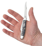 Case Gray Bone Medium Stockman pocket knife held in a hand with one blade open, showing its pocket size