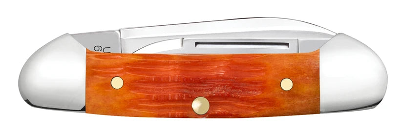 Reverse side of closed Case Tequila Sunrise Bone Baby Butterbean with orange-red jigged handle