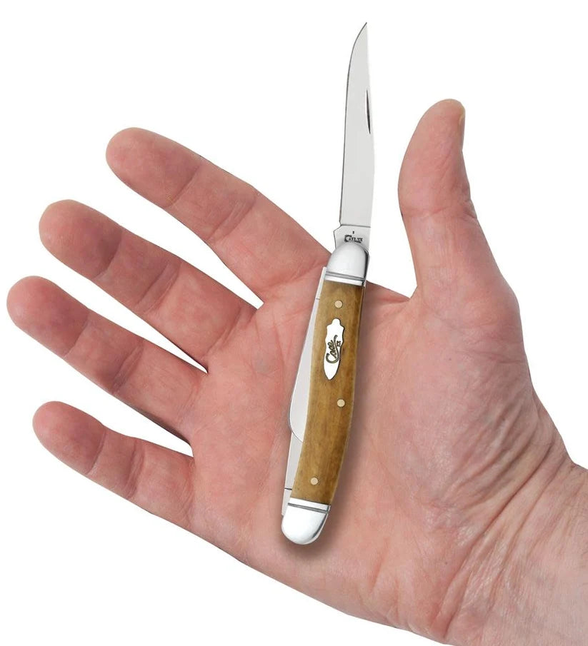 Case Smooth Antique Bone Medium Stockman pocket knife held in a hand with one blade open