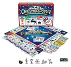 Christmas-Opoly board game setup with board, cards, play money, dice, and six Christmas-themed tokens