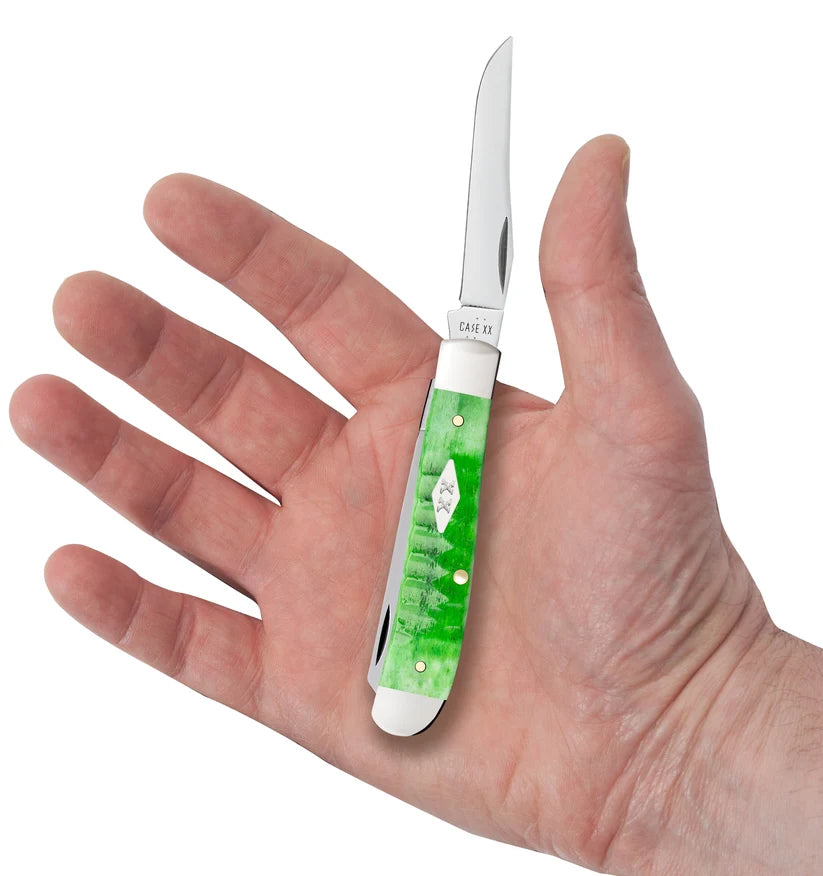 Case Gator Mini Trapper pocket knife with bright green handle held in hand