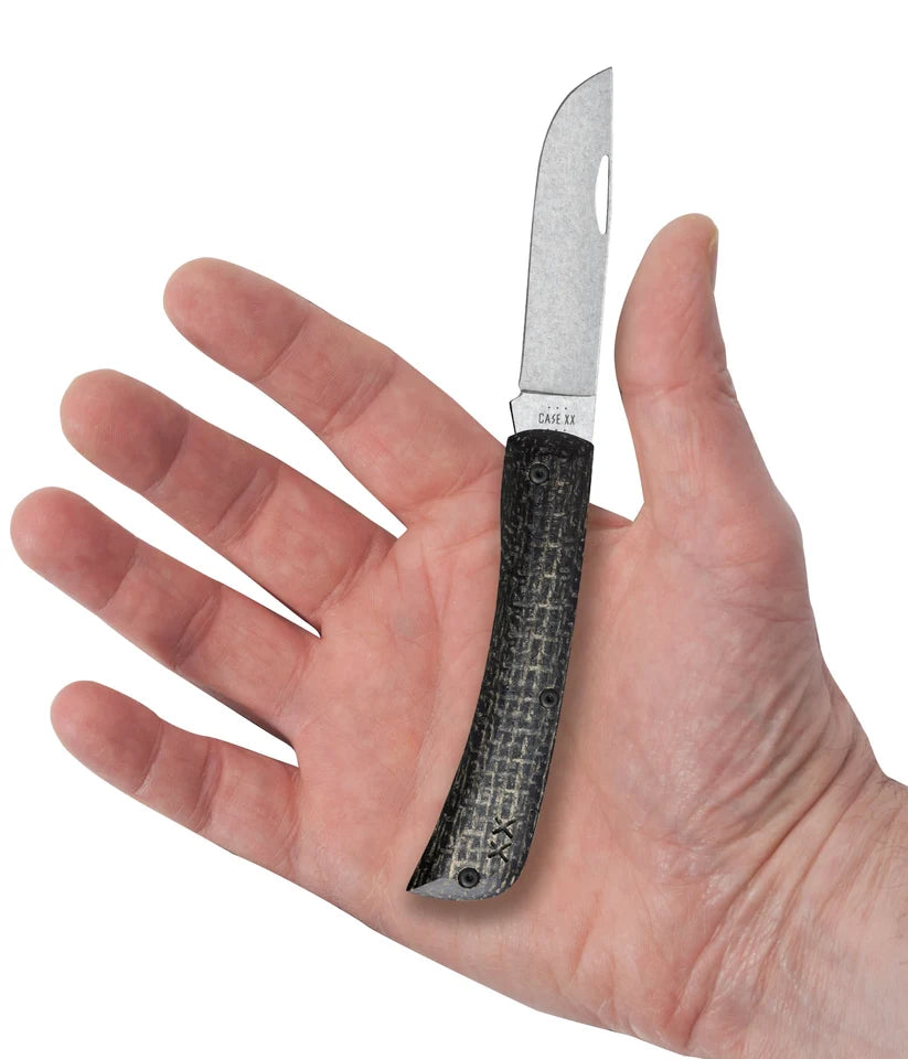 Case XR Sod Buster Jr. Black Burlap knife held in a hand with blade open