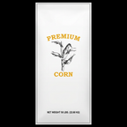 White 50 lb premium corn bag with gold lettering and a black corn illustration.