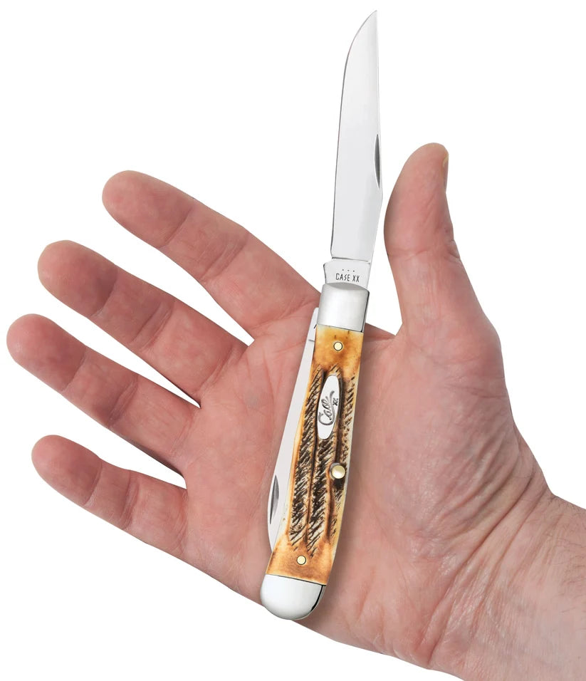 Case 6.5 BoneStag Trapper knife held in a hand with Clip blade open