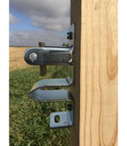 Side view of Sure-Latch one-way gate latch hardware