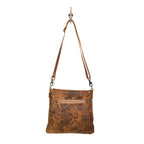 Myra vegetable-tanned leather bag with organized interior pockets