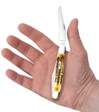 Case 6.5 BoneStag Muskrat knife held in a hand with one Clip blade open